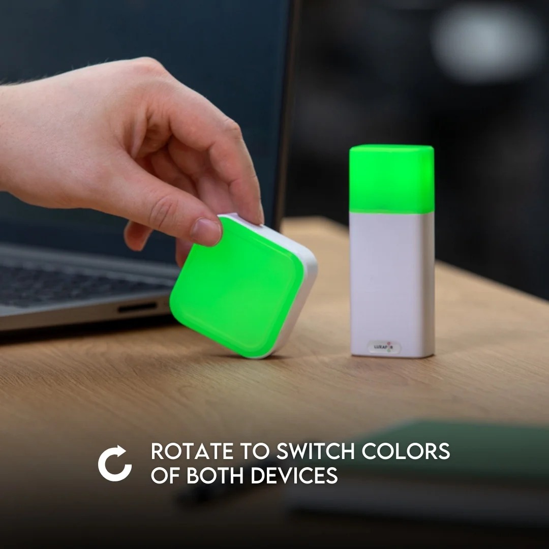 Rotating the desk light to switch the color of both devices at once